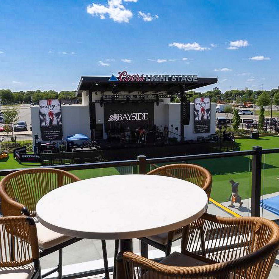 Stateside Live stage structure with lighting, roof framing, and performance equipment being prepared.